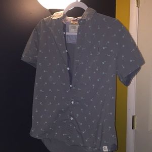 Short-sleeved button down shirt.